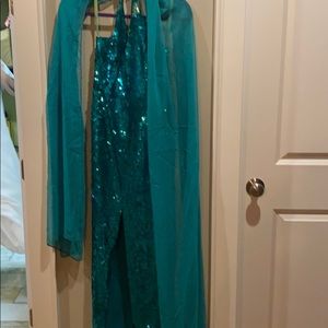 Full length green sequin prom dress with a shawl